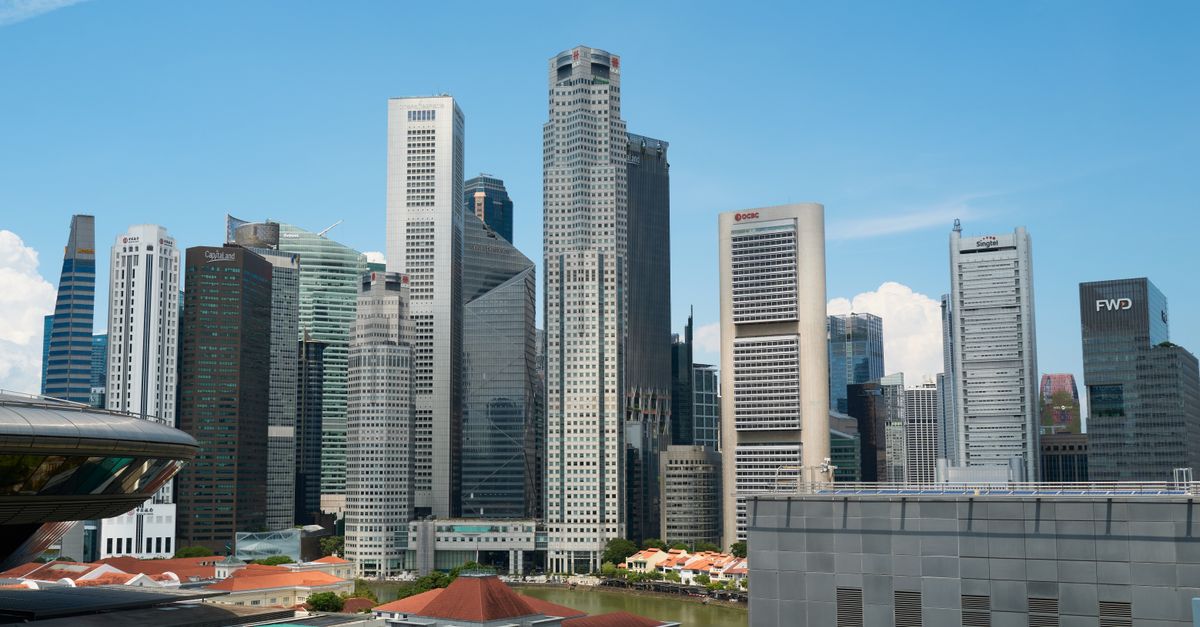 Custom Software & Mobile App Development Services in Singapore City Center – Expert Guide View of Singapore skyline showcasing modern skyscrapers on a clear day.