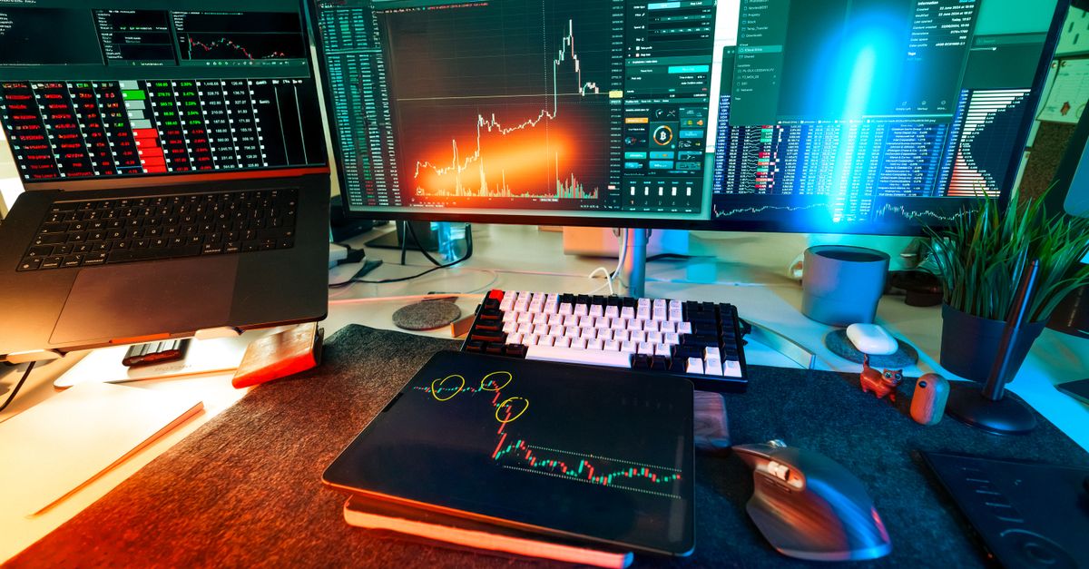 How to Manage Facebook Ads with AI Workflow Automation in Kuala Lumpur Vibrant trading setup with multiple screens displaying cryptocurrency charts and data analysis tools.