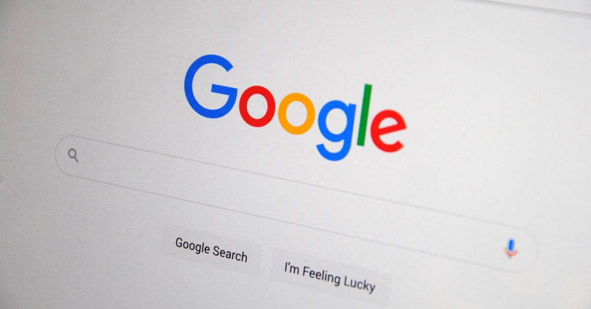 How to Rank on Google and Get Cited by AI: SEO, GEO, AEO Strategies for London Businesses Close-up of the Google homepage on a screen showing search options.