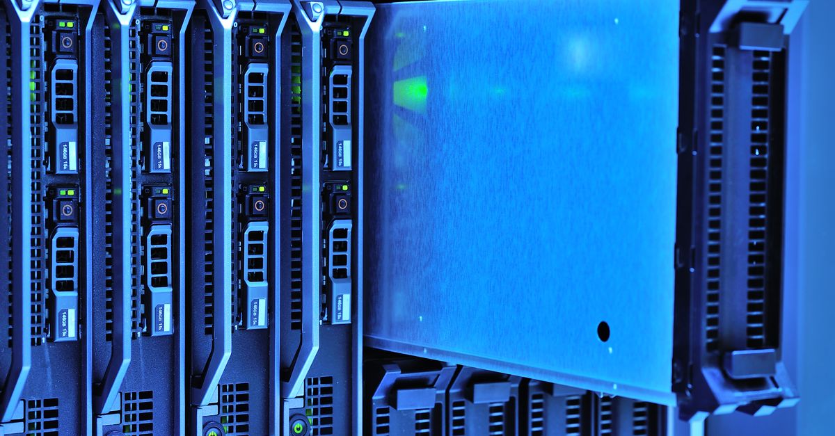 Scale Without the Server Room: Cloud IT Infrastructure Strategies for London Businesses Detailed view of server racks with glowing lights in a data center environment.